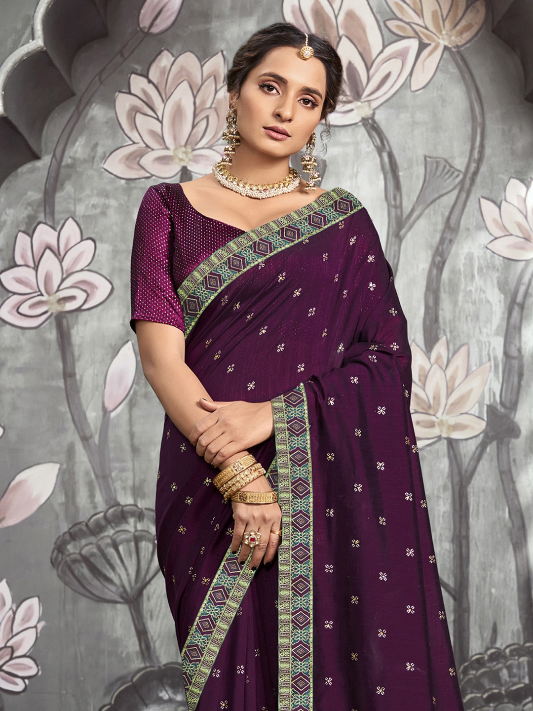 

Satrani Purple & Green Embroidered Silk Blend Saree