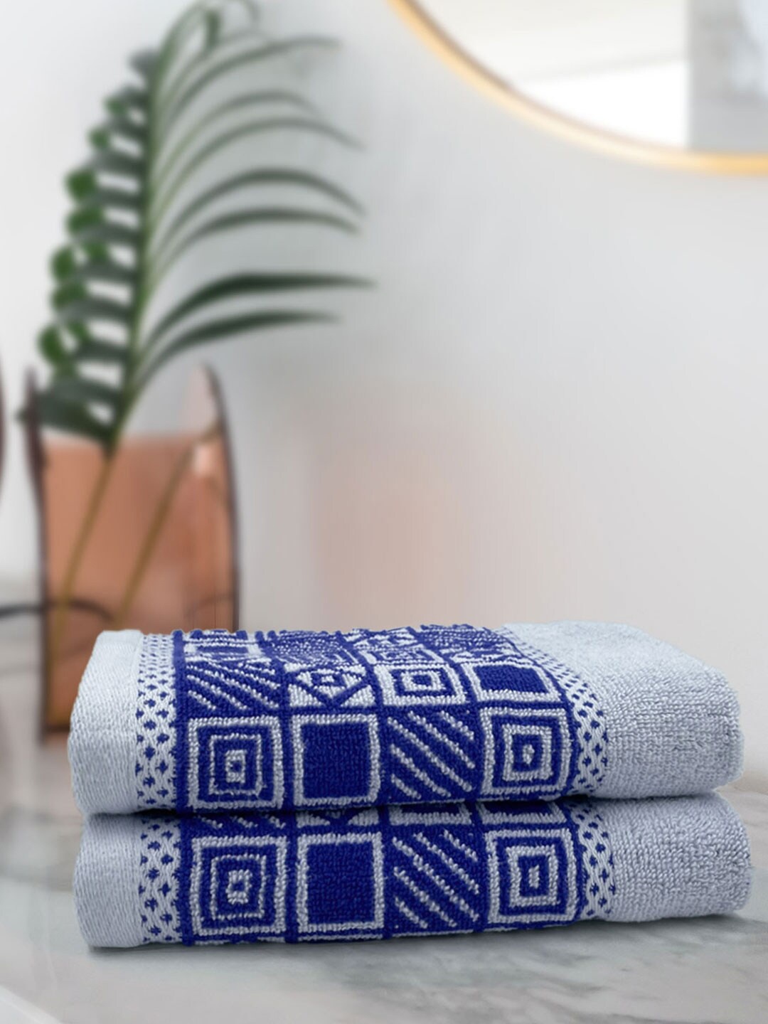 

Aura Set of 2 Blue Printed Cotton 380 GSM Hand Towels