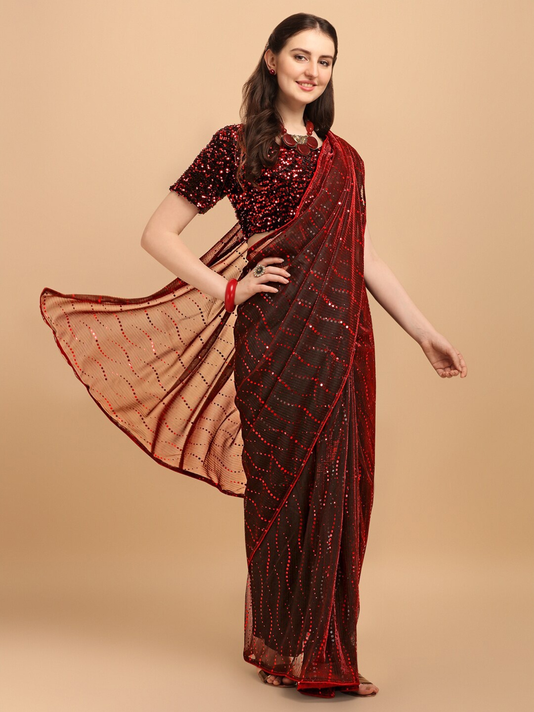 

Fab Viva Red Embellished Sequinned Net Saree With Sequences Blouse Piece