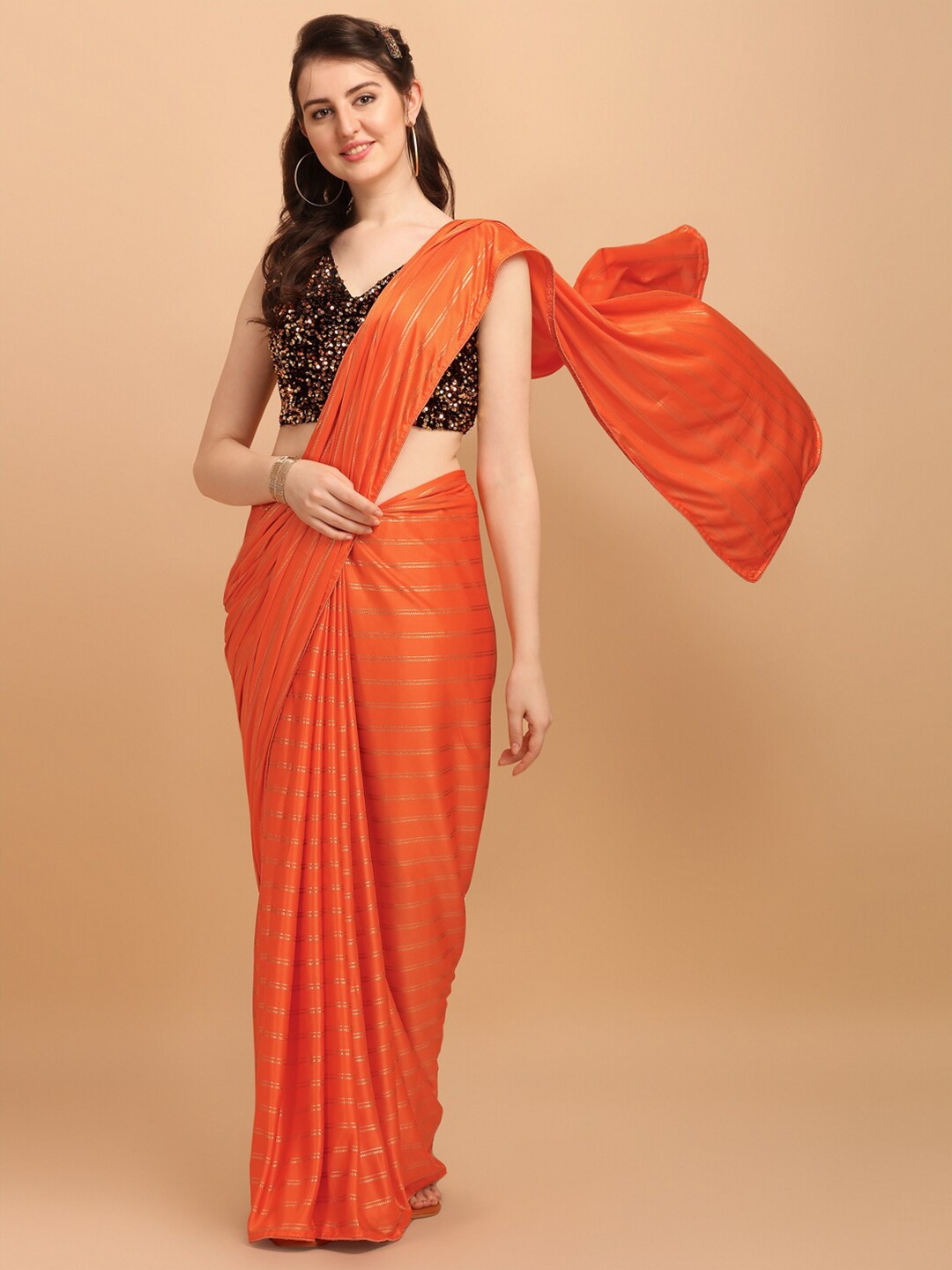 

Fab Viva Orange & Gold-Toned Striped Lycra Saree With Sequences Blouse Piece