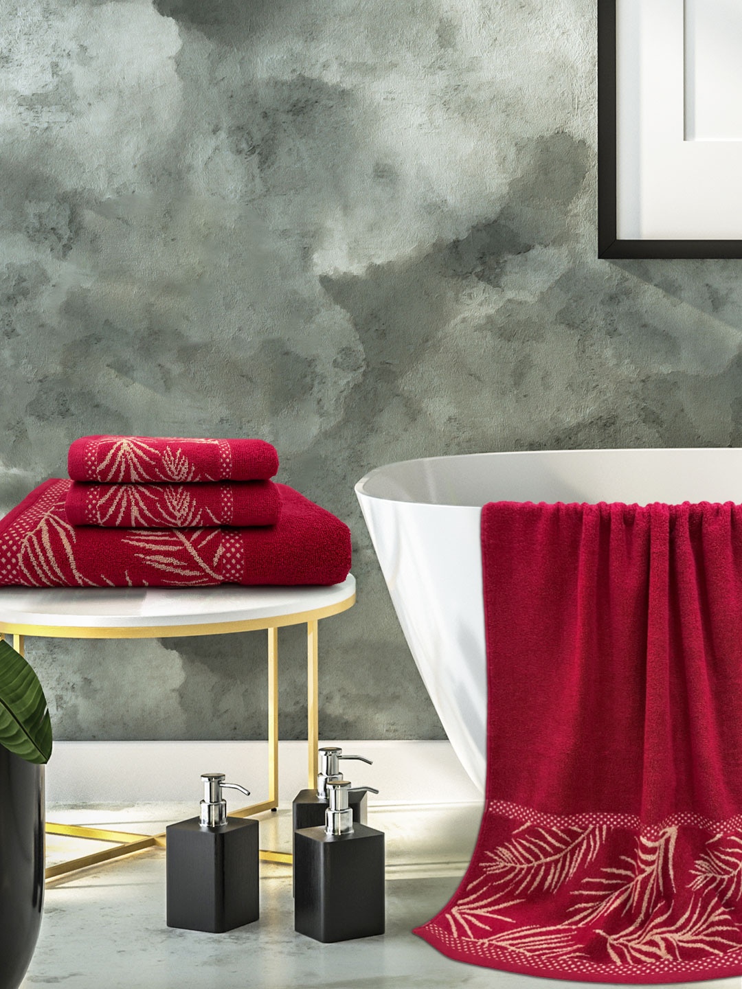 

Aura Set Of 4 Wedelia 380 GSM Leaf Printed Cotton Hand And Bath Towel Set, Maroon