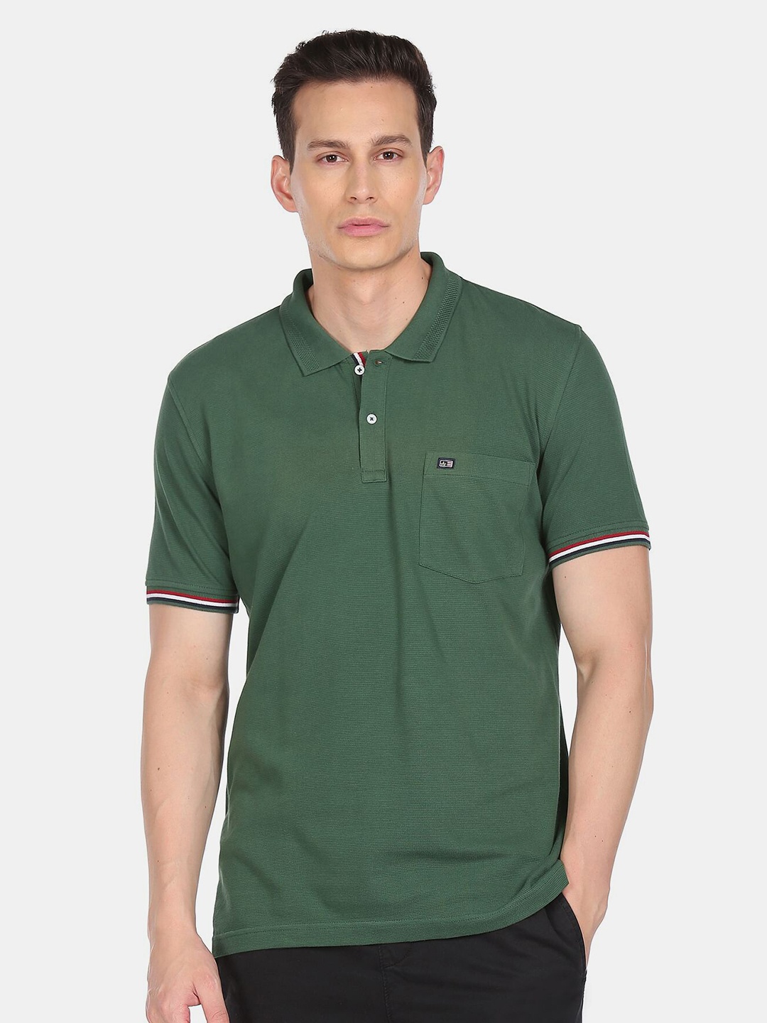 

Arrow Sport Men Green Solid Polo Collar T-shirt