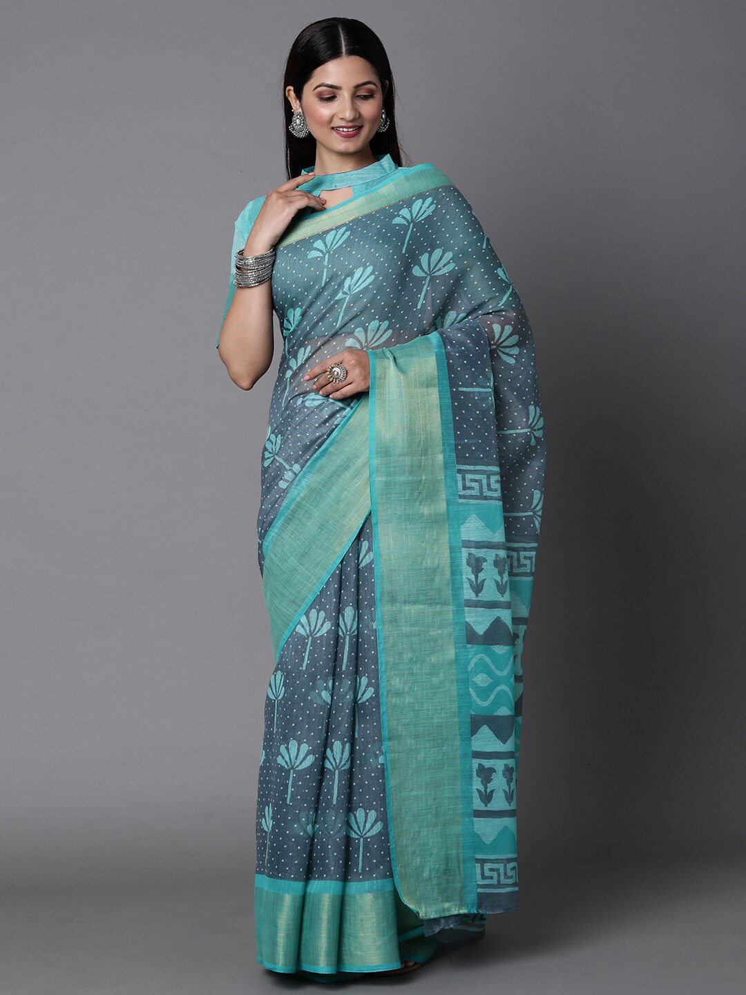

Mitera Sea Green & Silver-Toned Floral Zari Silk Cotton Muga Saree with Matching Blouse