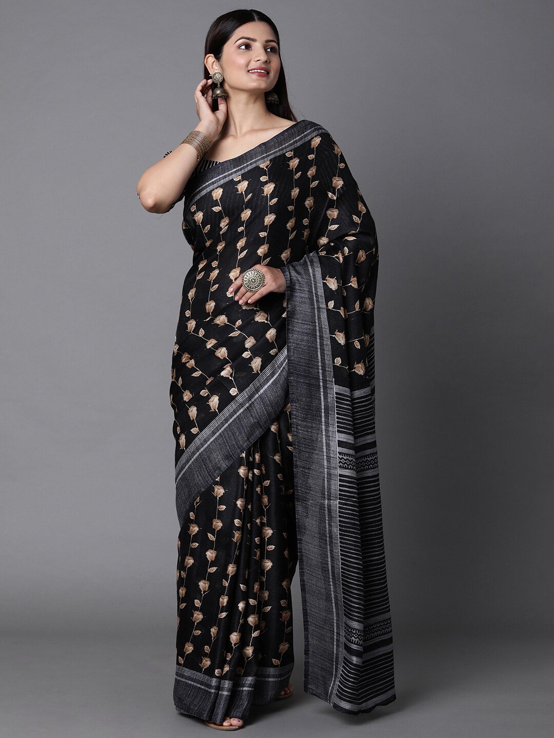 

Mitera Black & White Floral Jute Cotton Saree with Matching Blouse