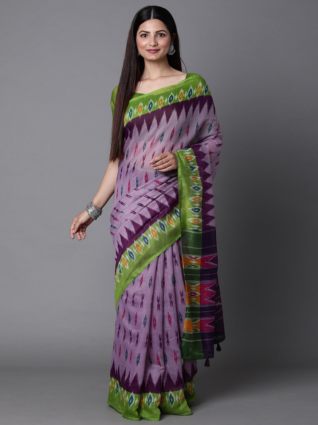 

Mitera Lavender & Green Ethnic Motifs Silk Cotton Ikat Saree with Matching Blouse