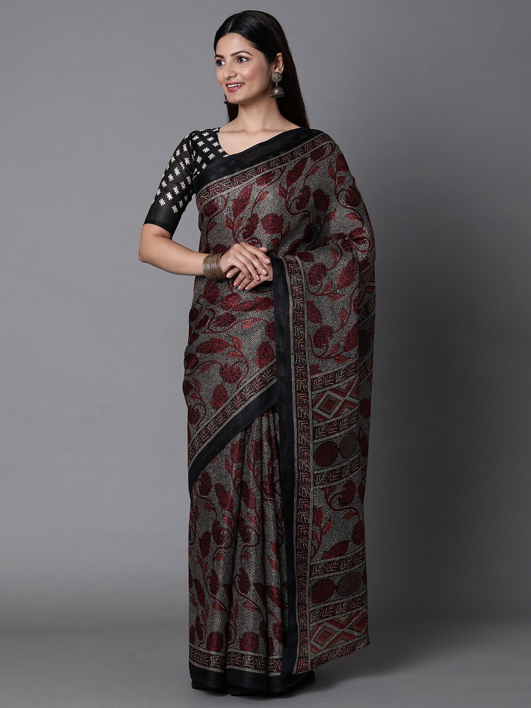 

Mitera Black & Maroon Ethnic Motifs Jute Cotton Banarasi Saree with Matching Blouse