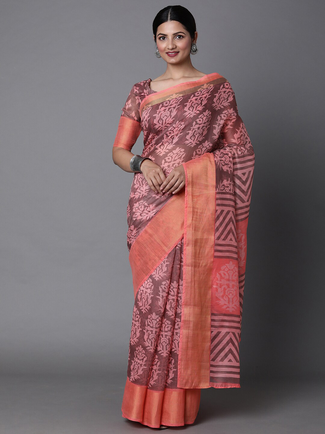 

Mitera Peach & Coffee Brown Ethnic Motifs Printed Silk Cotton Muga Saree