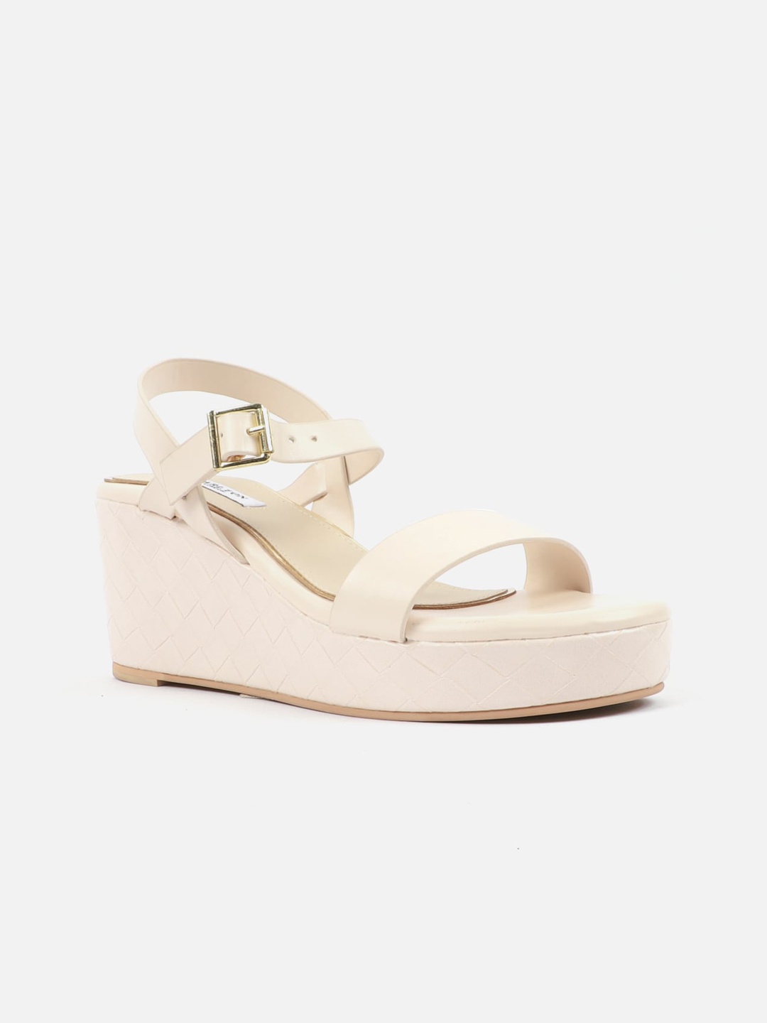 

Carlton London Beige Solid Wedge Heels