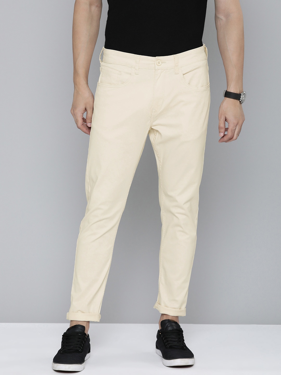 

Flying Machine Men Beige Solid Comfort Slim Tapered Fit Mid-Rise Plain Woven Trousers