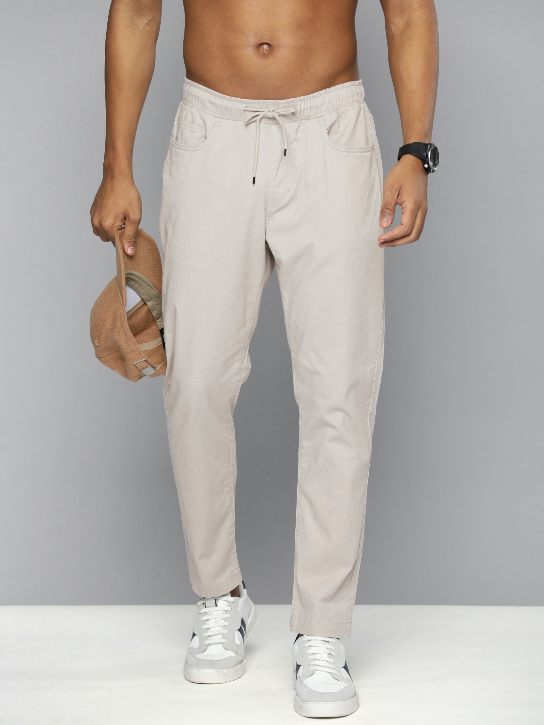 

Flying Machine Men Solid Slim Fit Casual Trousers, Beige