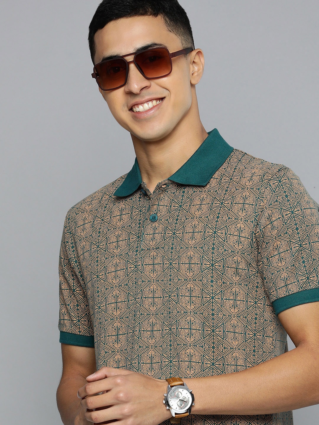 

Flying Machine Men Teal & Mustard Yellow Printed Polo Collar Pure Cotton T-shirt
