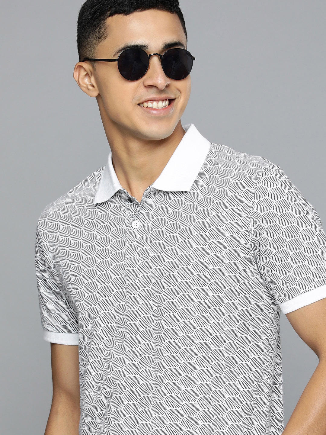 

Flying Machine Men White & Black Printed Polo Collar Pure Cotton T-shirt