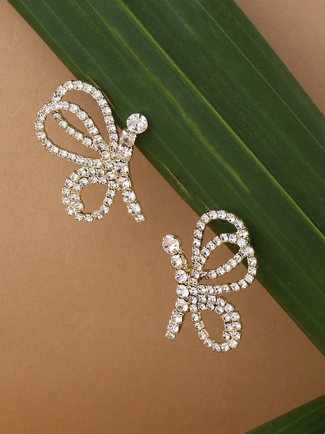 

Yellow Chimes Gold-Plated Studded Contemporary Stud Earrings