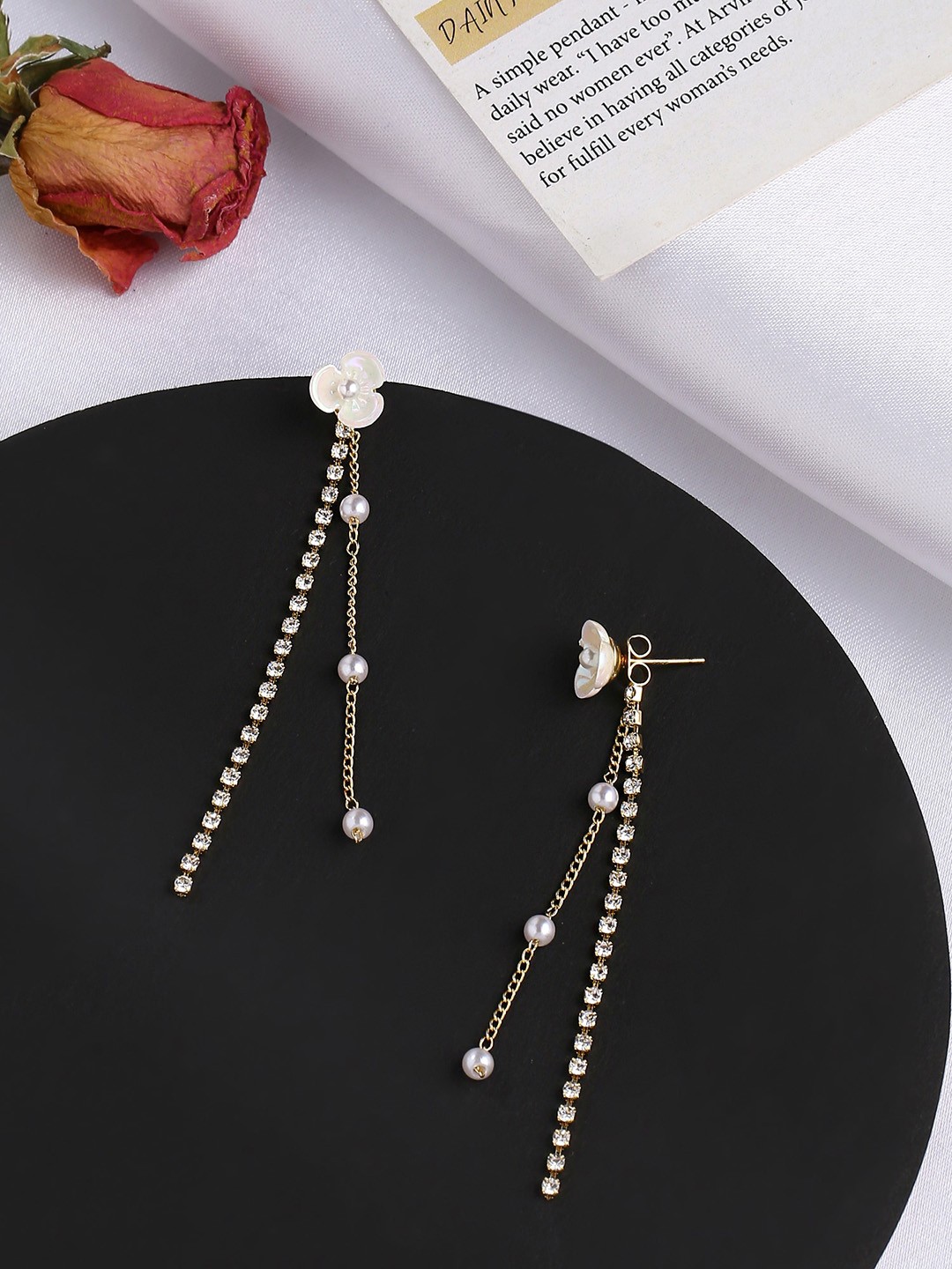 

Yellow Chimes Gold Tone White Color Floral Designed Long Crystal Dangle Earrings
