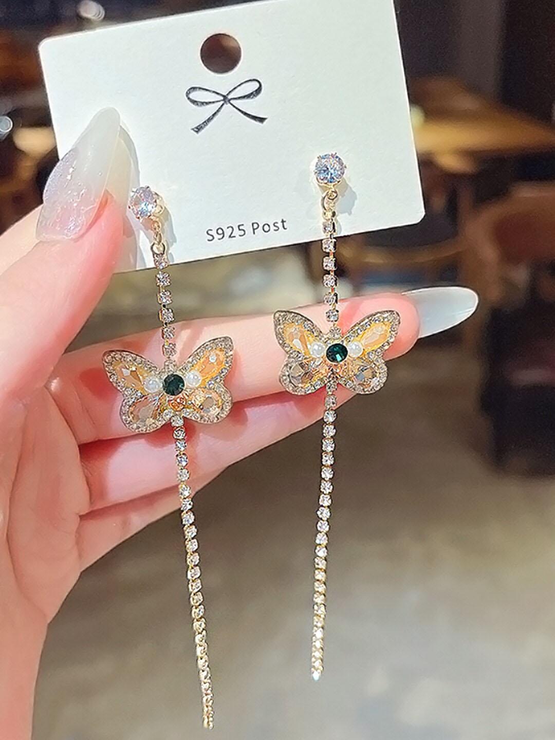 

Yellow Chimes Women Gold-Plated & Beige Butterfly Stud Drop Earrings