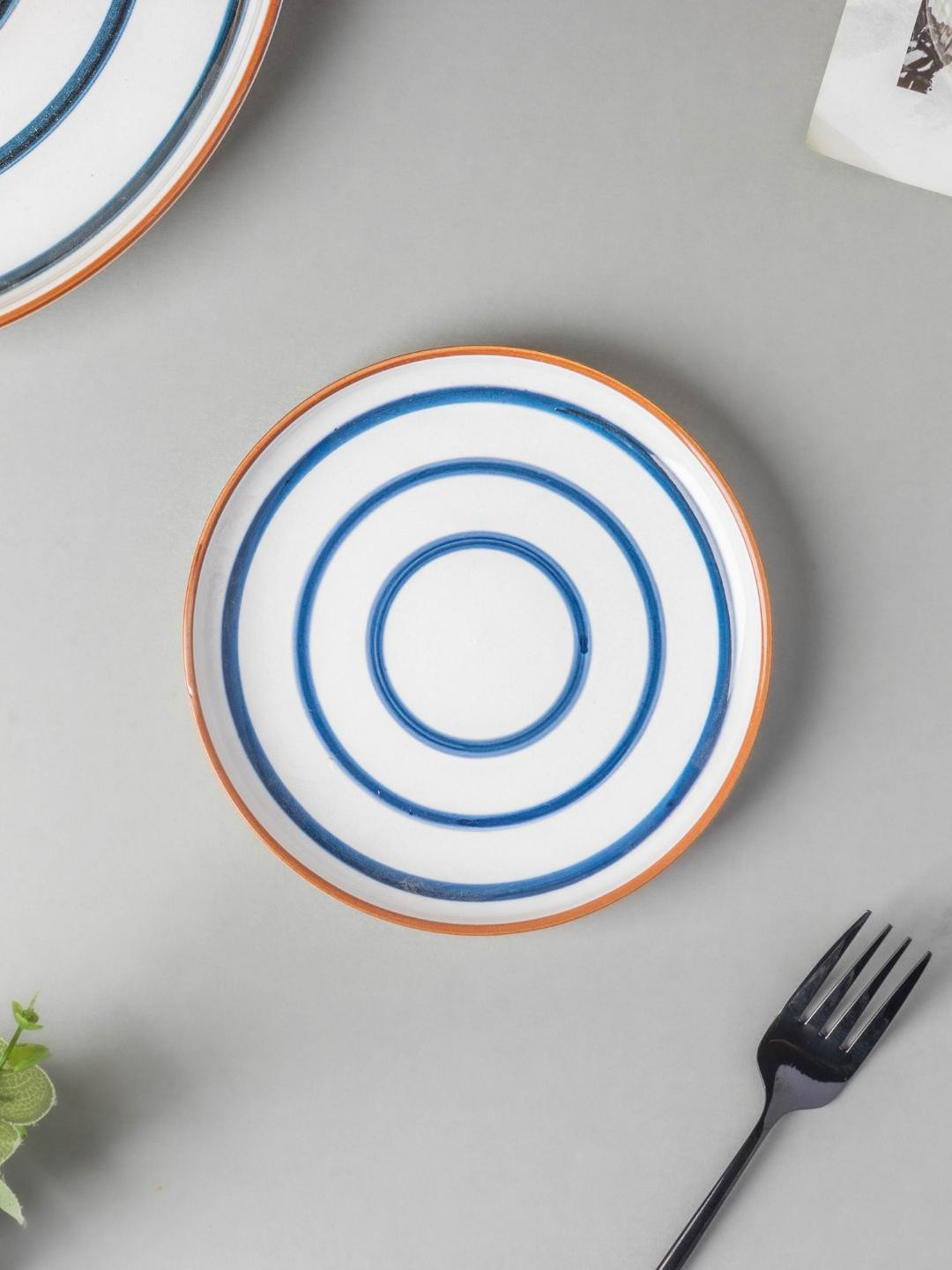 

Nestasia White & Blue Microwave safe Printed Ceramic Glossy Plate