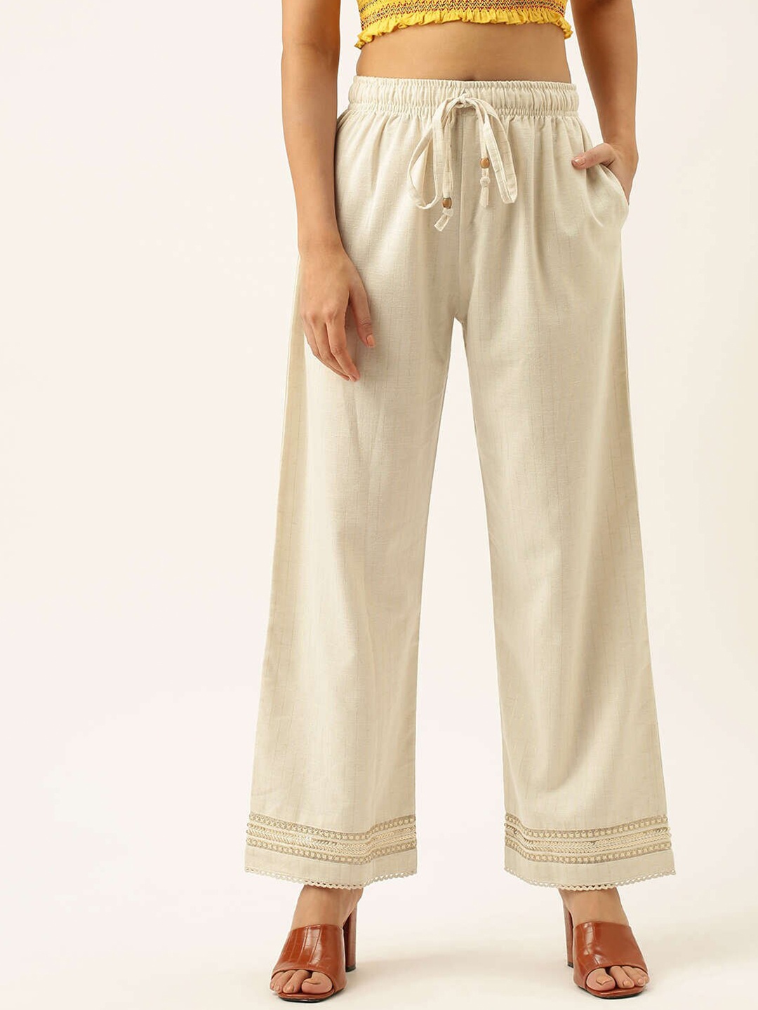 

ZOLA Women Cream Self Design Cotton Comfort Fit 1 Pocket Palazzos