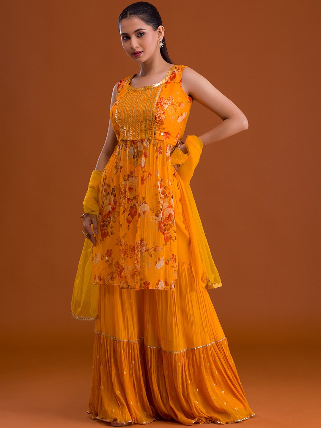 

Koskii Women Mustard Floral Printed Sequinned Kurta with Sharara & With Dupatta