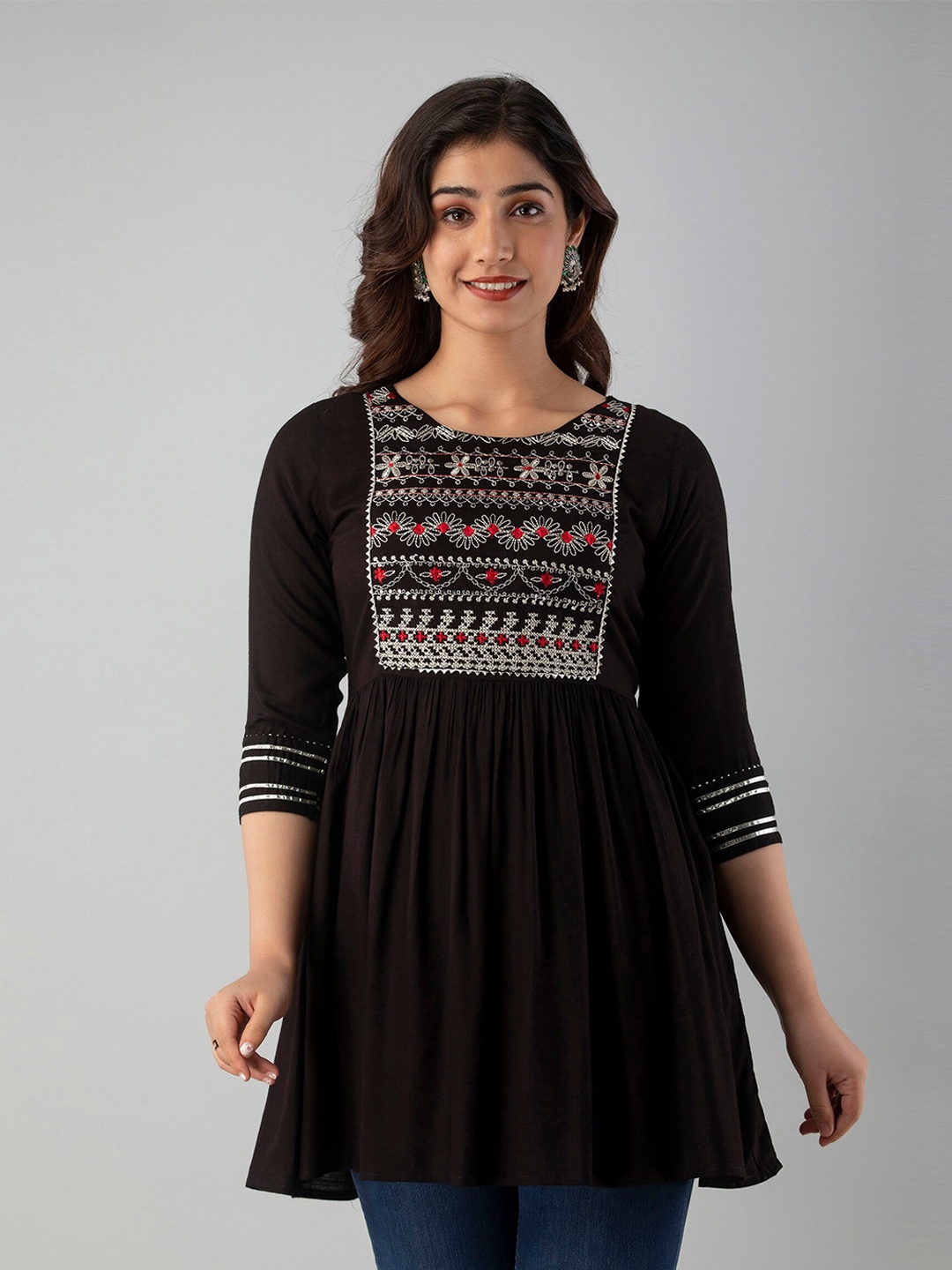 

CKM Brown Embroidered Longline Top