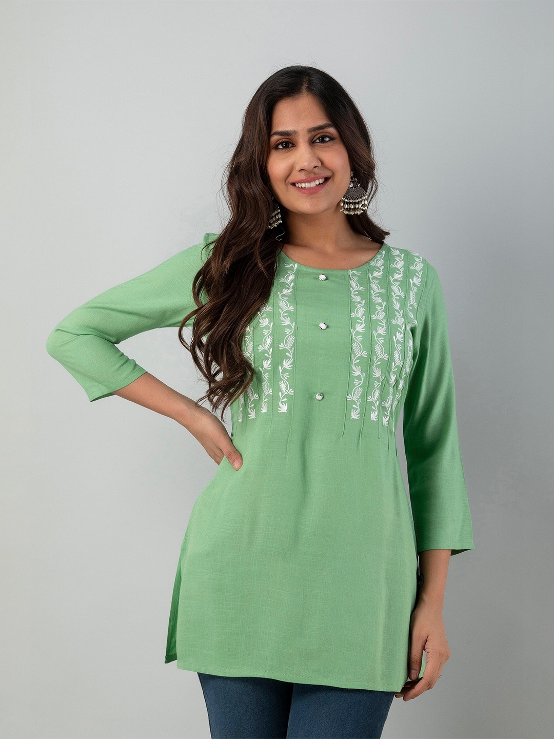 

CKM Women Green Floral Embroidered Pleated Long Line Top