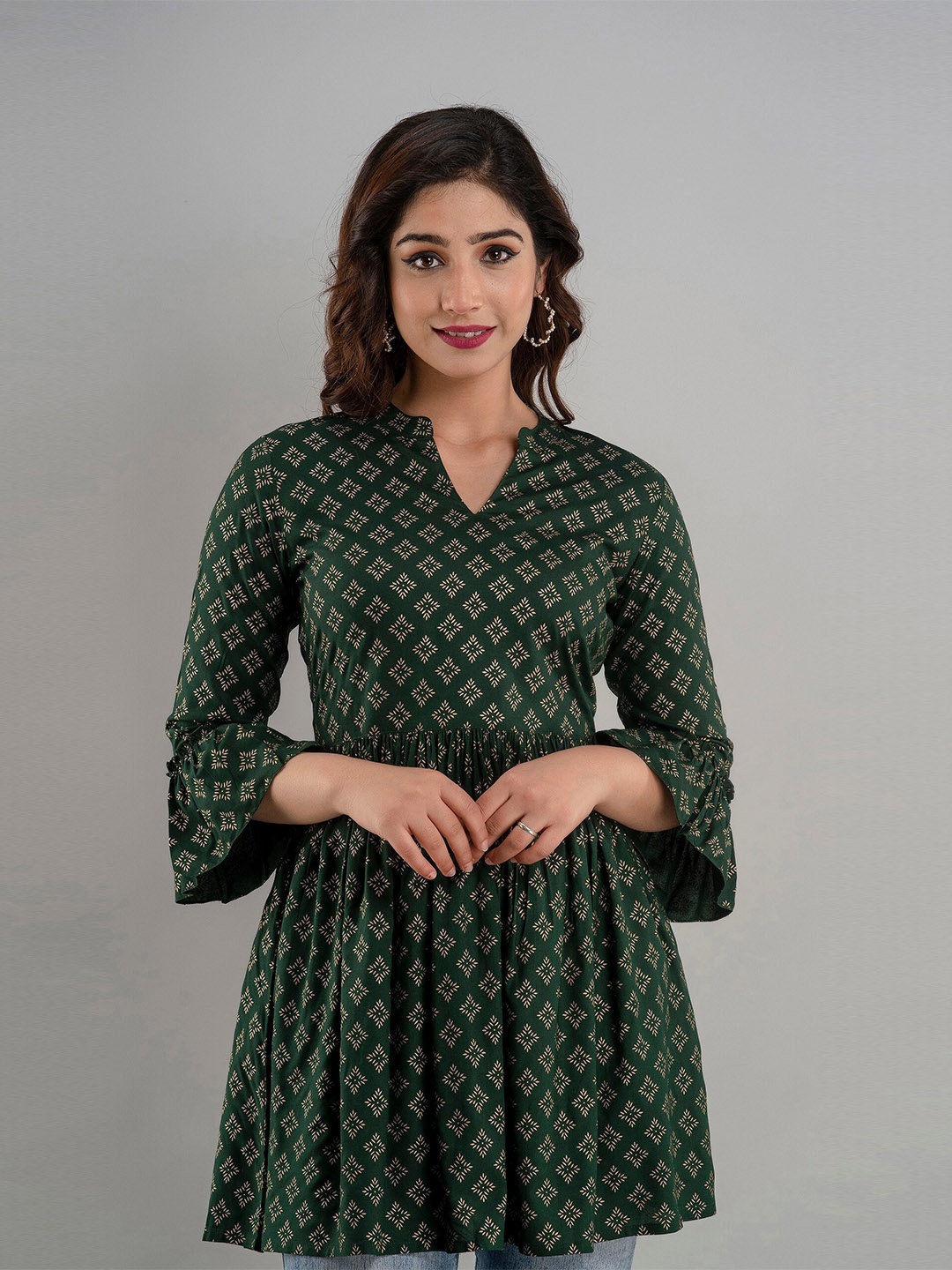 

CKM Ethnic Motifs Printed Bell Sleeves Kurti, Green