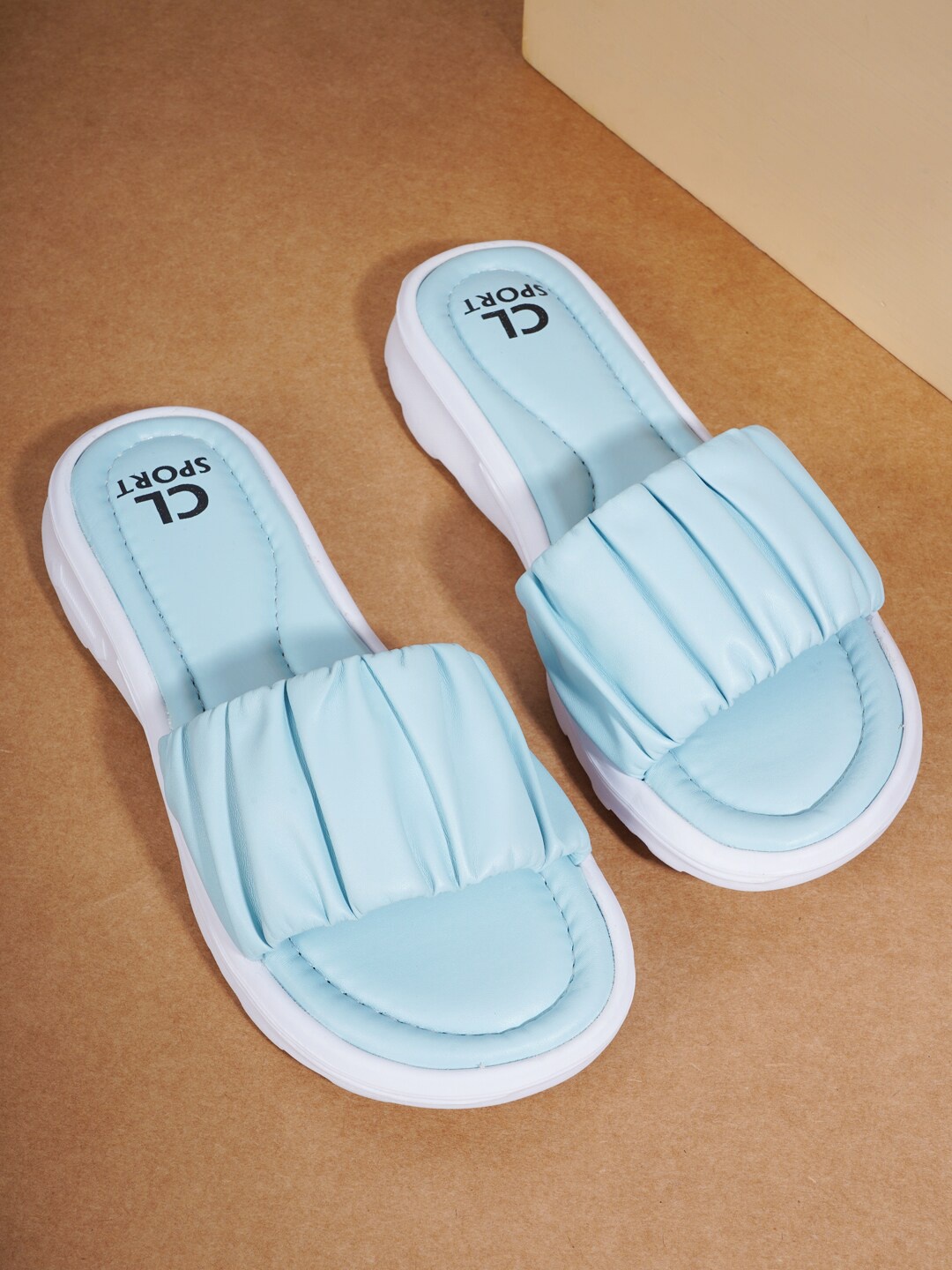 

Carlton London sports Women Textured Sliders, Blue