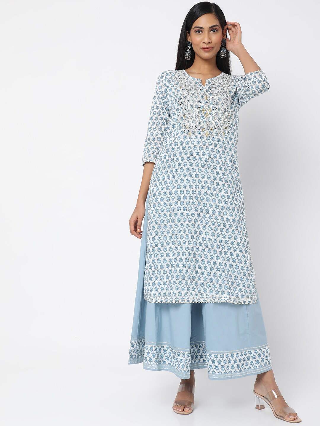 

Ethnicity Women White Floral Printed & Yoke Thread Work Kurta with Palazzo