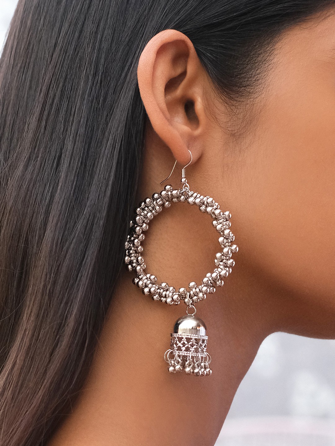 

Ayesha Women Silver-Toned Silver-Plated Oversized Ghungroo Drop Earrings