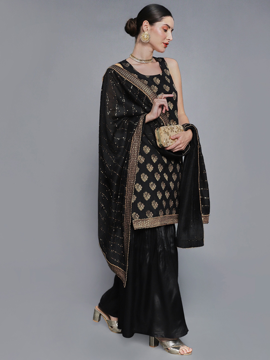 

Sunehri Women Black Floral Kurta with Sharara & With Dupatta