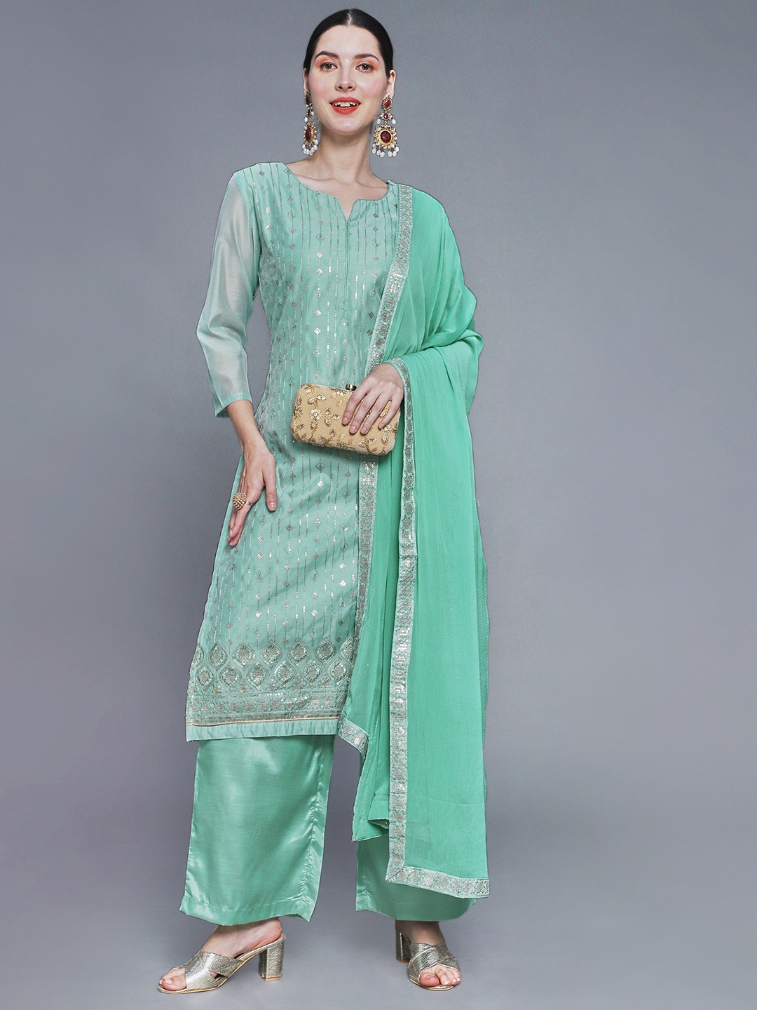 

Sunehri Women Sea Green Floral Embroidered Sequinned Chanderi Silk Kurta with Palazzos & With Dupatta