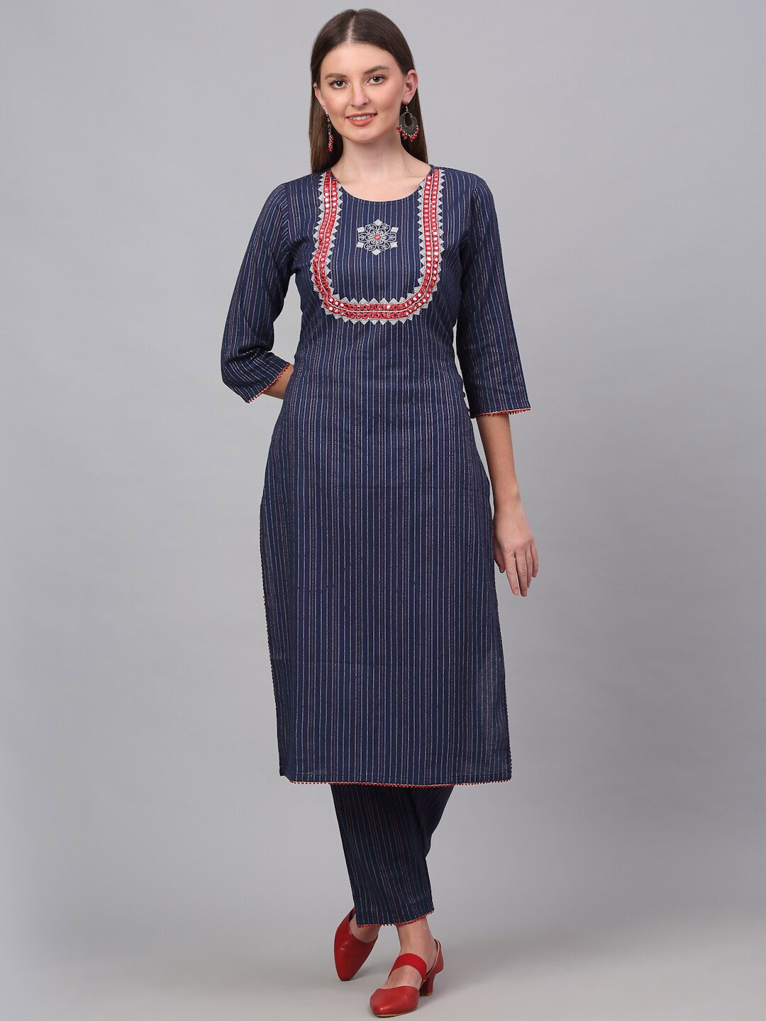 

Kamayra Women Navy Blue Yoke Design Mirror Work Kurta with Trousers