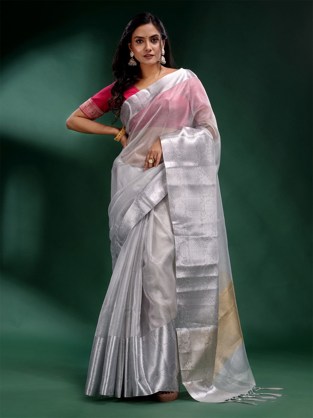 

Charukriti Silver Woven Design Zari Tissue Saree