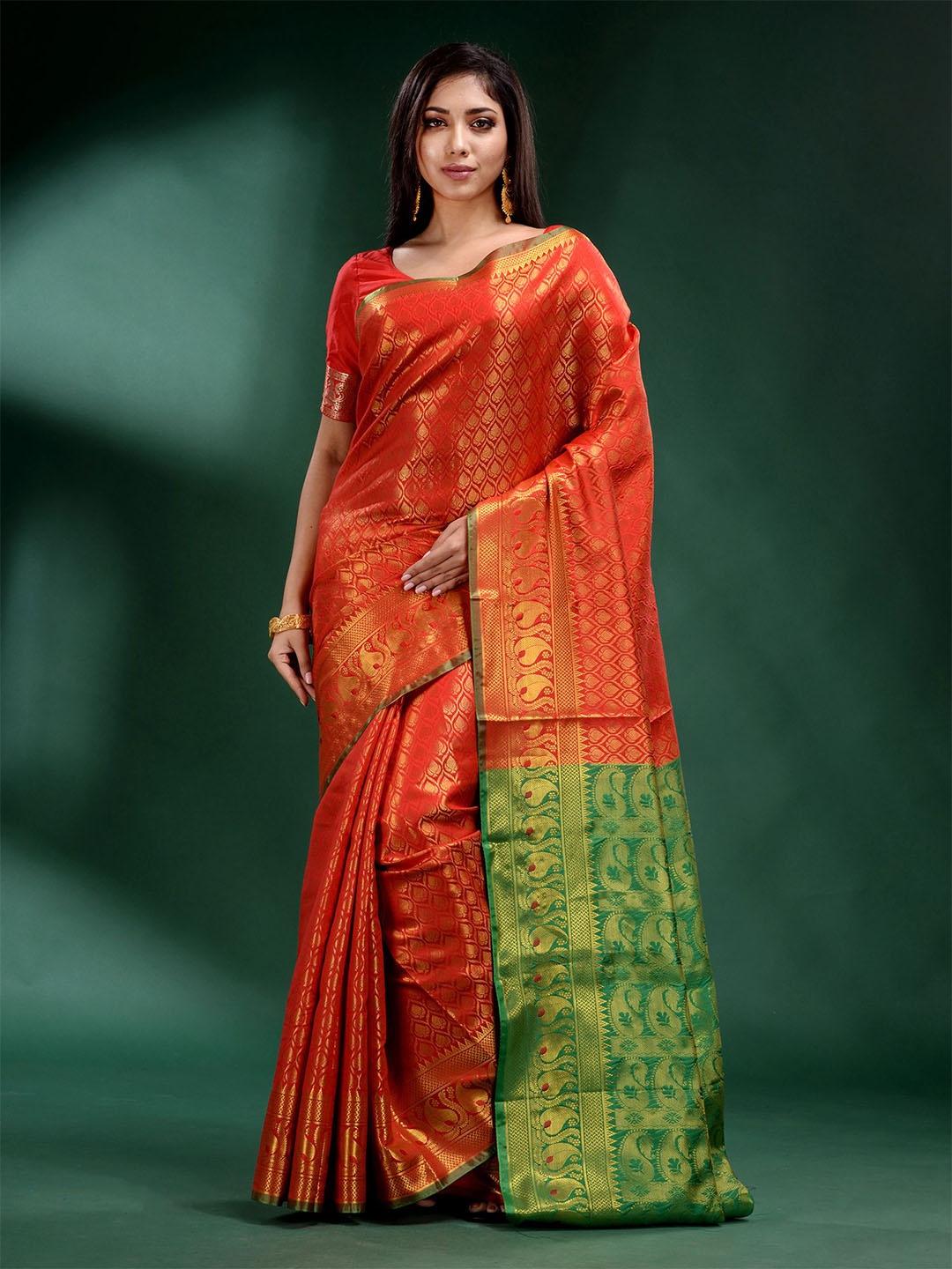 

Charukriti Orange & Green Woven Design Zari Pure Silk Saree