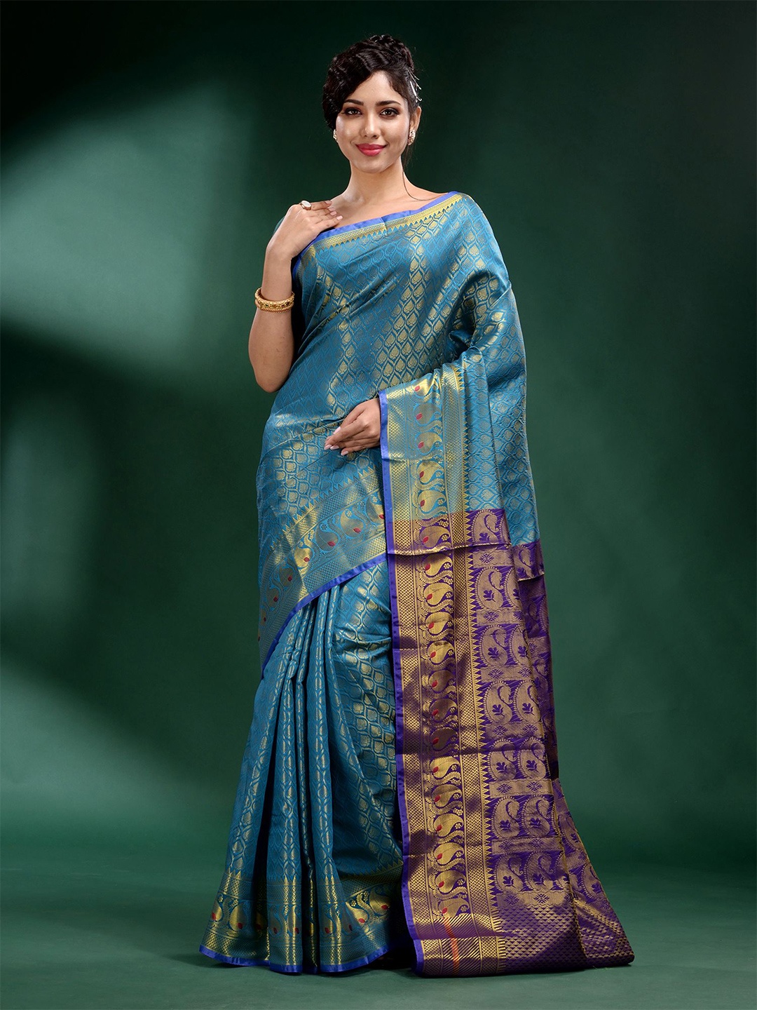 

Charukriti Blue & Navy Blue Woven Design Zari Saree