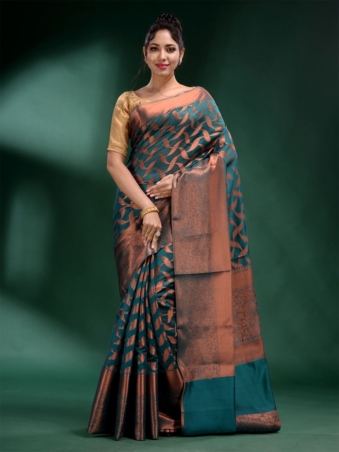 

Charukriti Teal Green And Copper Toned Woven Design Zari Organza Saree