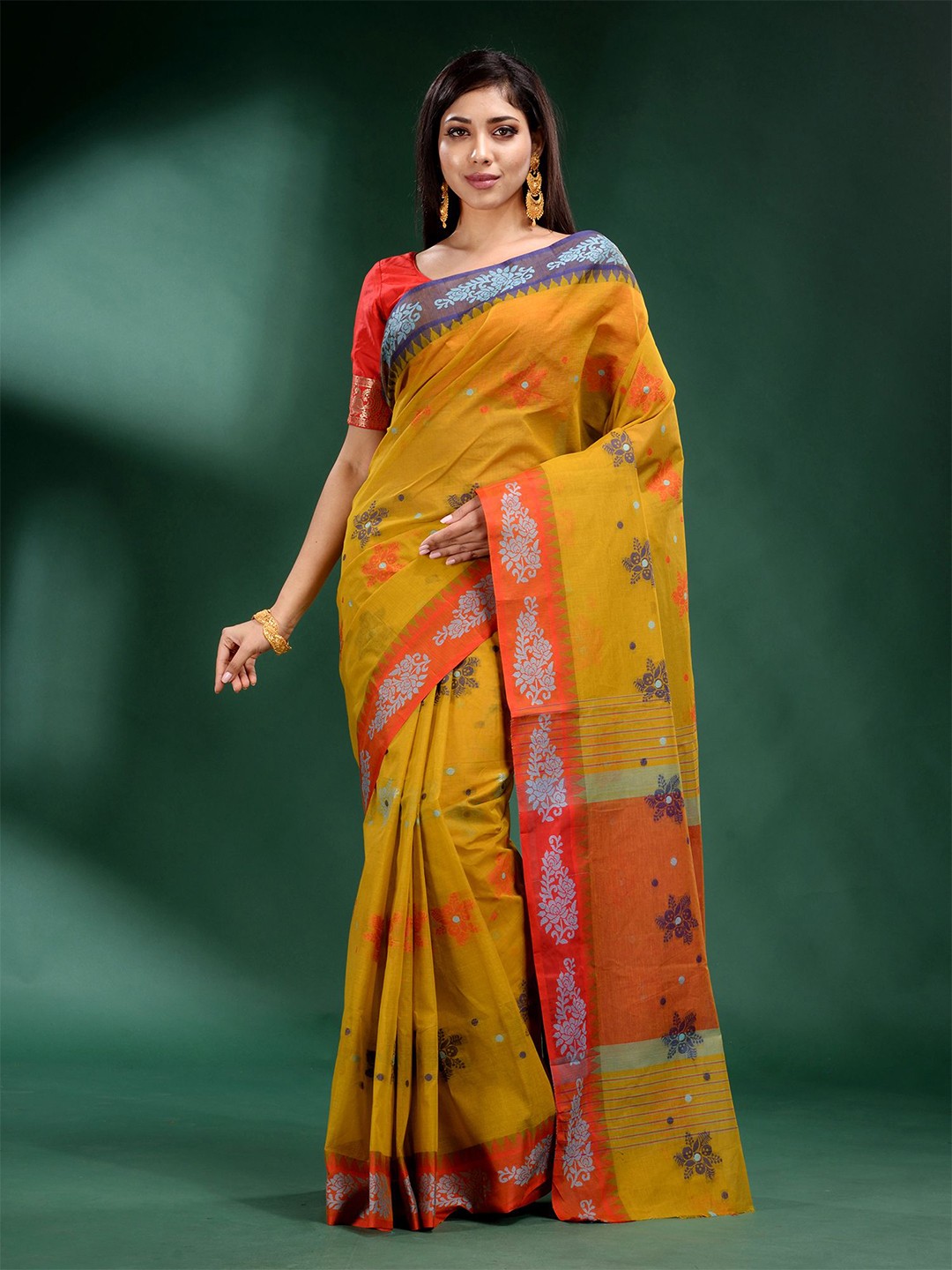 

Charukriti Mustard Yellow & Orange Floral Pure Cotton Saree