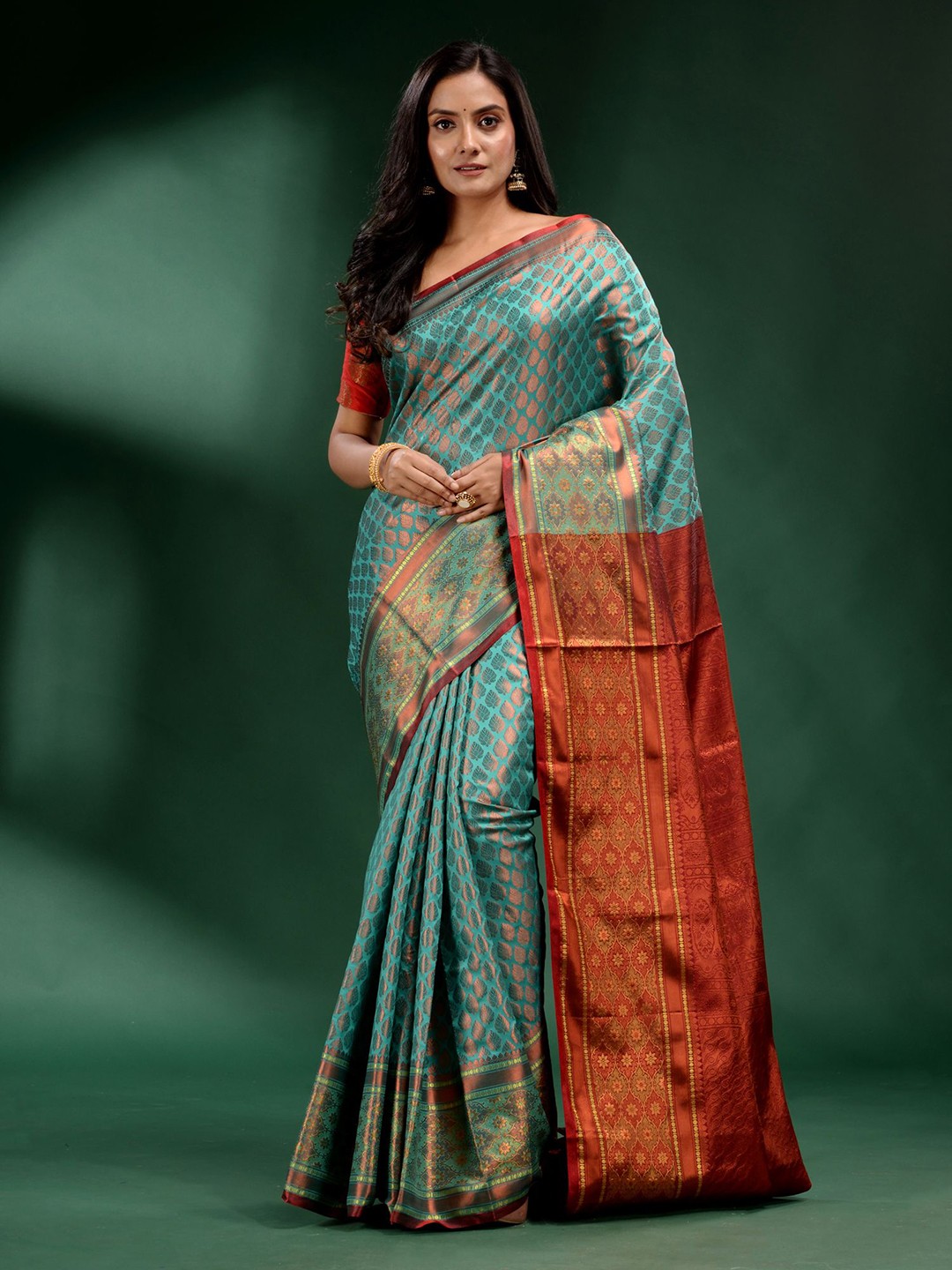 

Charukriti Green & Red Woven Design Zari Silk Blend Saree
