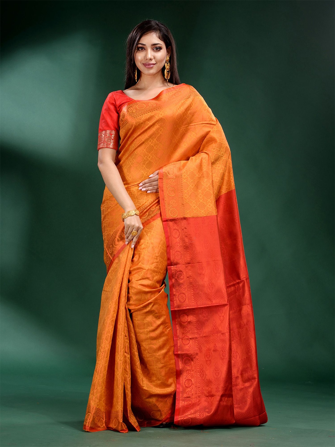 

Charukriti Mustard & Red Ethnic Motifs Zari Silk Blend Saree