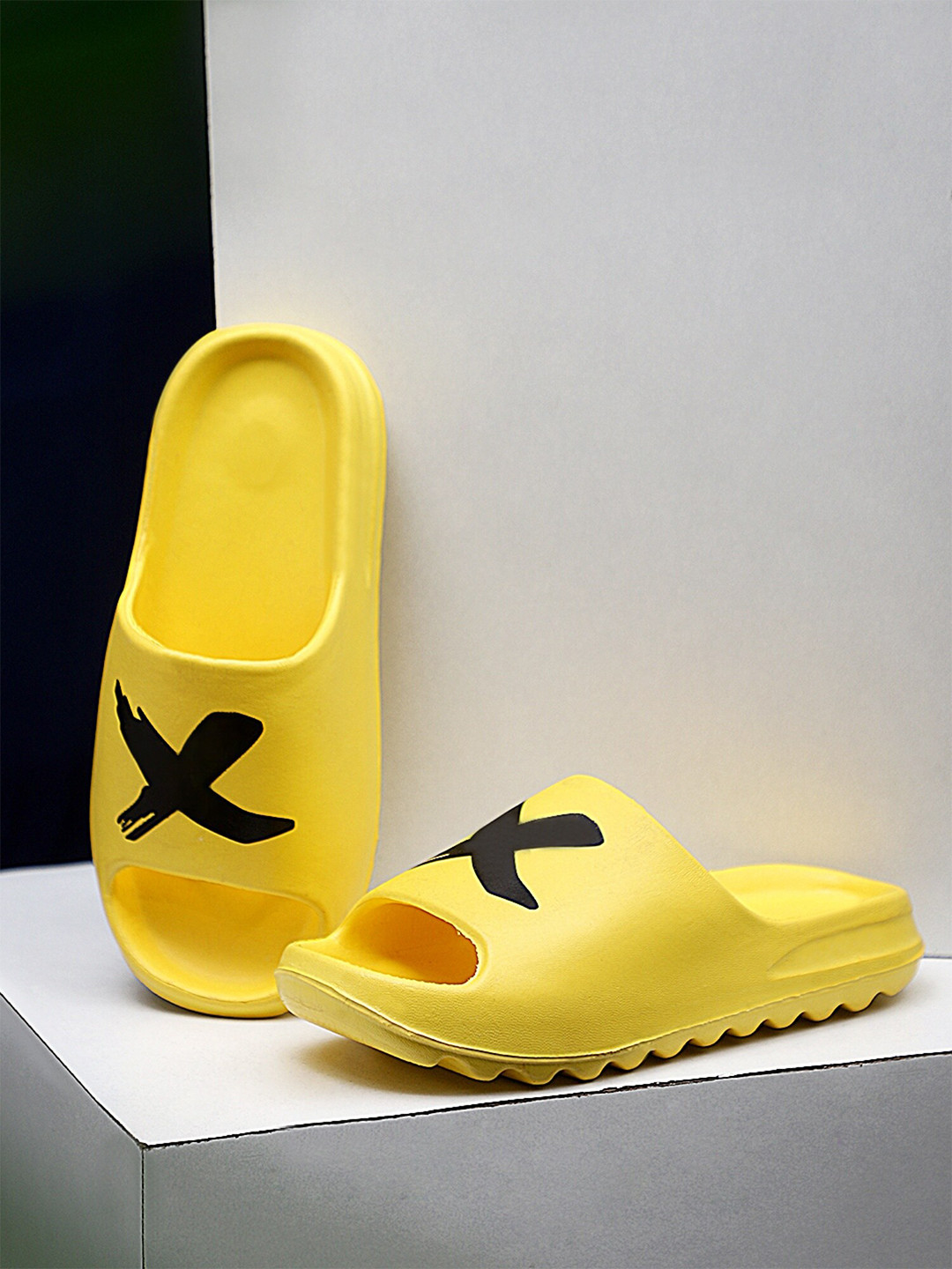

Pampy Angel Men Printed Rubber Flip Flops, Yellow