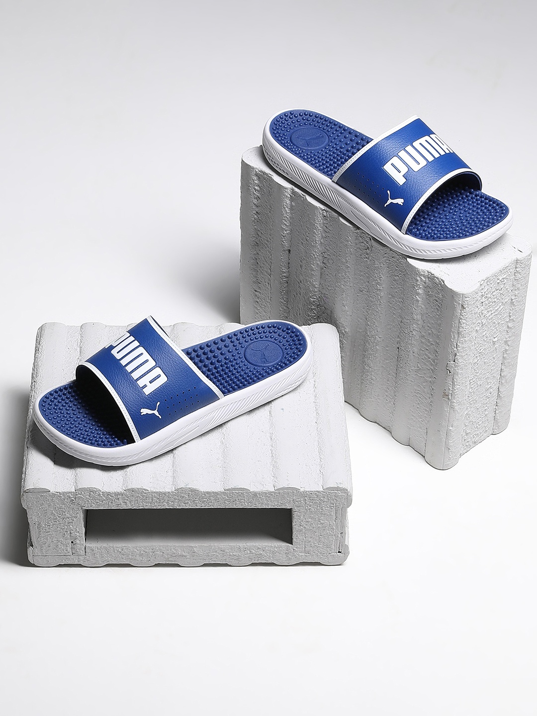 

Puma Men Blue Softride Slide Massage Sliders