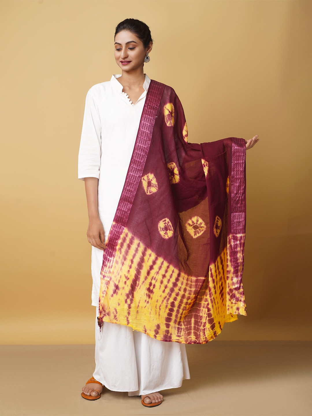 

Unnati Silks Women Purple And Yellow Tie And Dye Pure Cotton Shibori Dupatta
