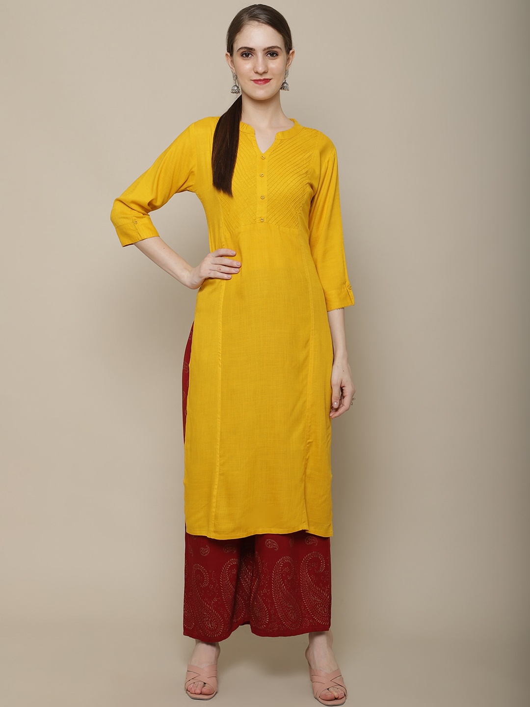 

Sangria Women Solid Straight Kurta, Mustard