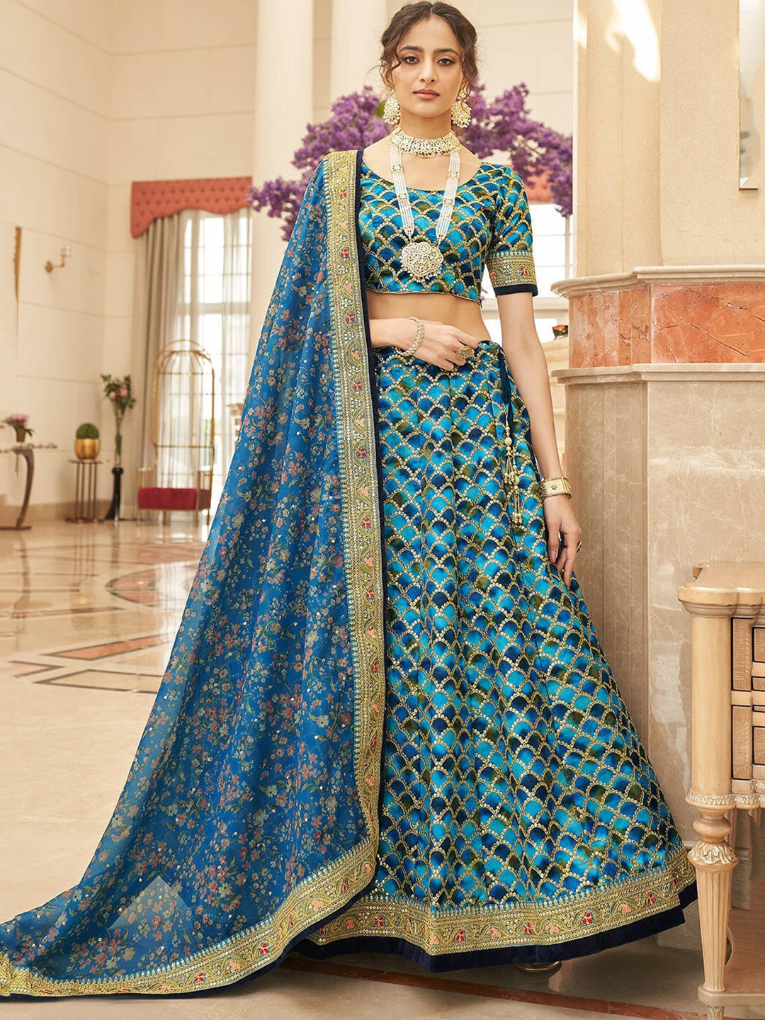

FABPIXEL Blue & Green Embroidered Semi-Stitched Lehenga Choli