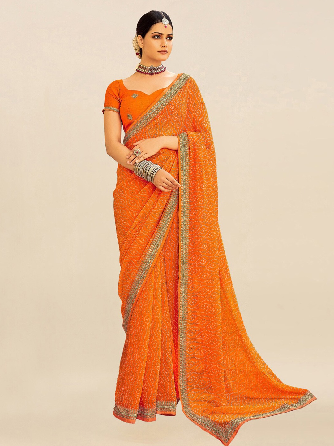 

Mitera Orange & White Embroidered Pure Georgette Bandhani Saree