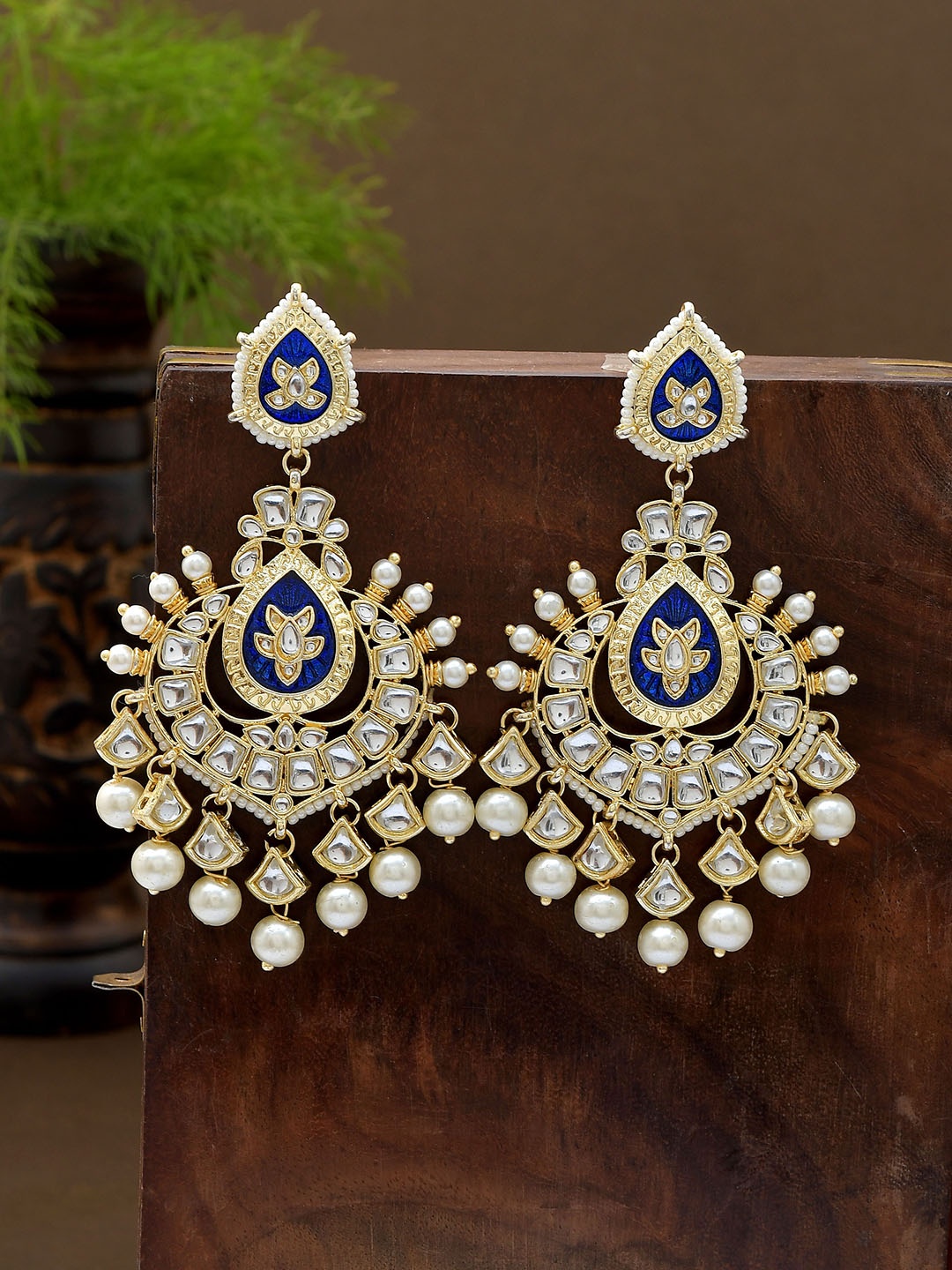 

Shoshaa Women Gold And Blue Gold Plated Kundan Studded Chandbali Earrings