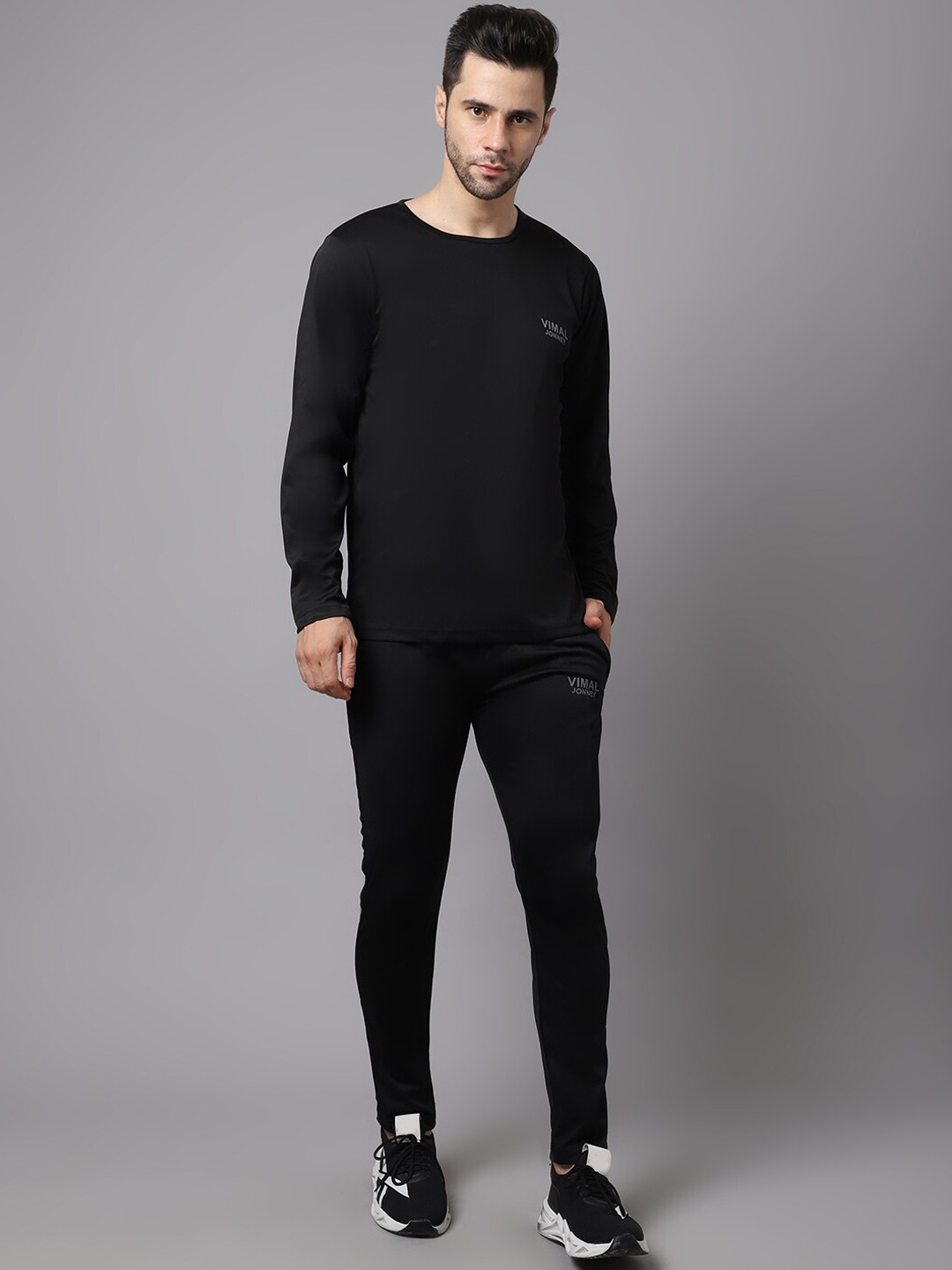 

VIMAL JONNEY Men Black Solid Sports Tracksuit