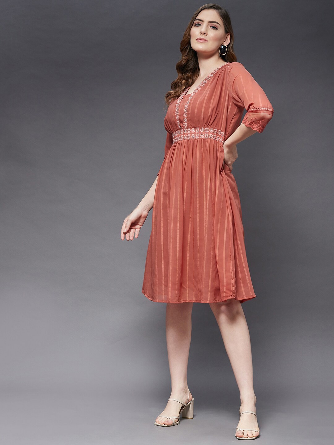 

Azira Women Brown Floral Georgette Empire Dress