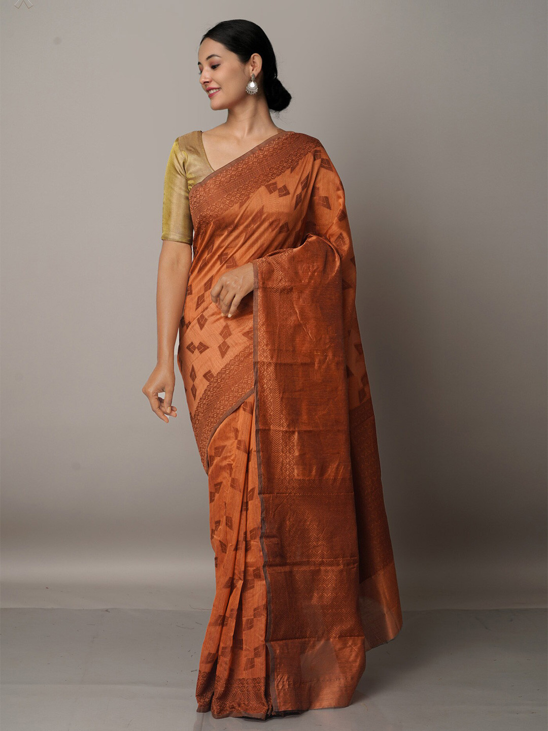 

Unnati Silks Brown Woven Design Silk Cotton Chanderi Saree