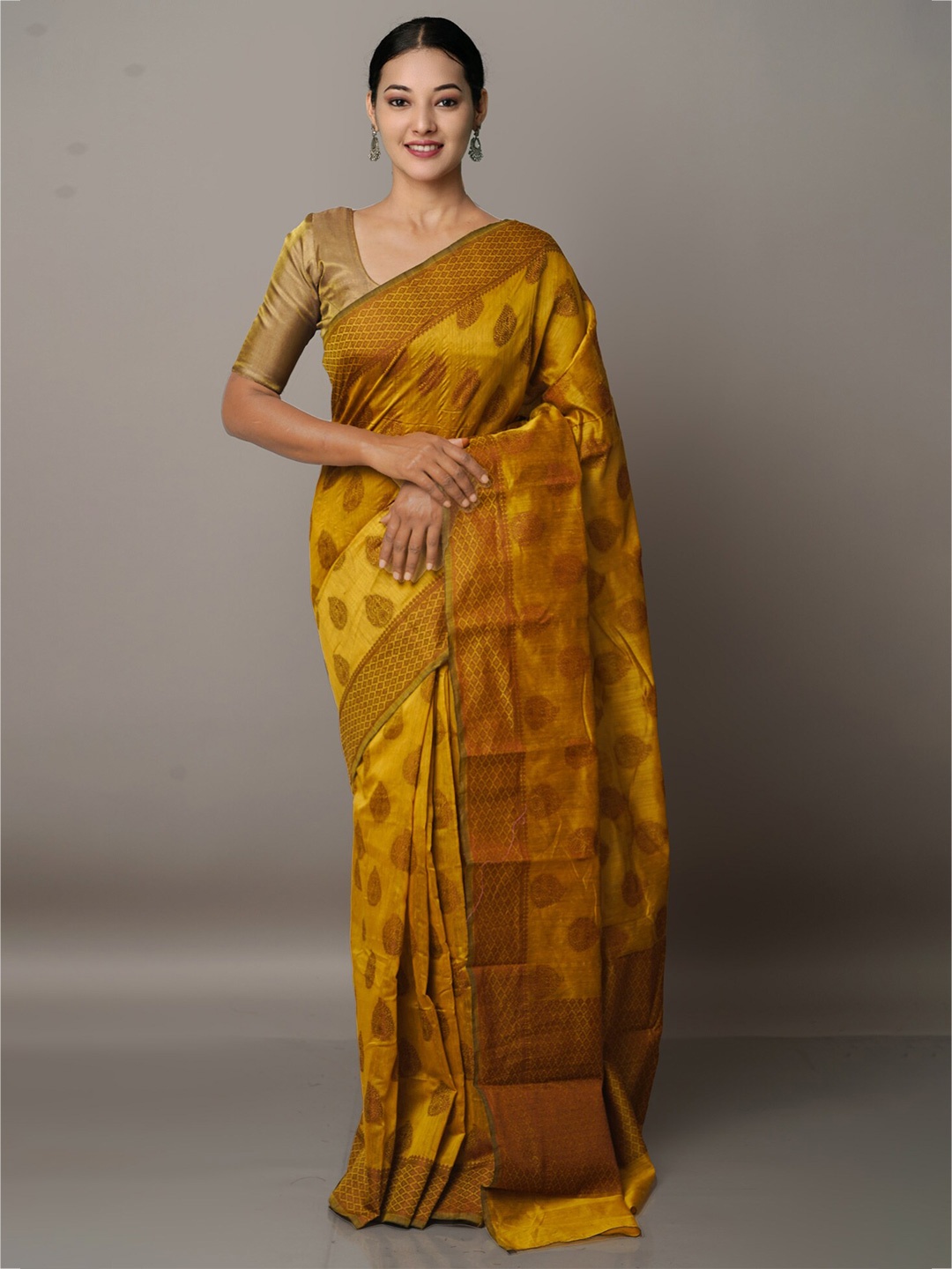 

Unnati Silks Yellow & Green Woven Design Silk Cotton Chanderi Saree