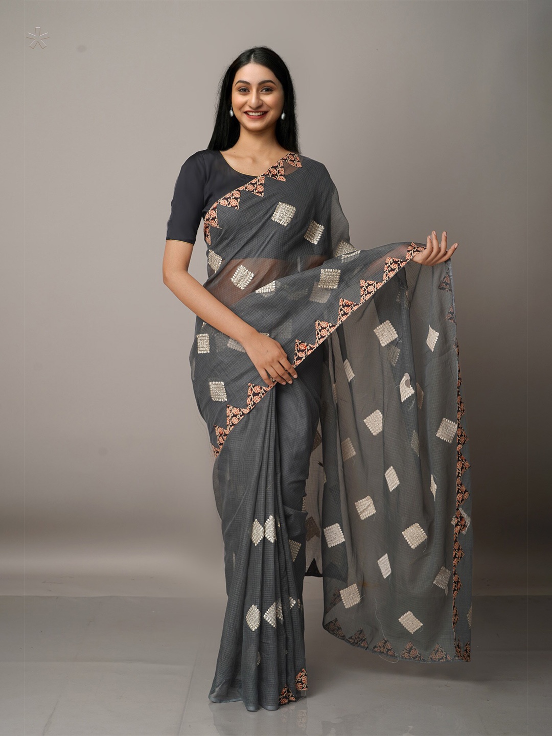 

Unnati Silks Grey & Pink Ethnic Motifs Embroidered Supernet Patola Saree
